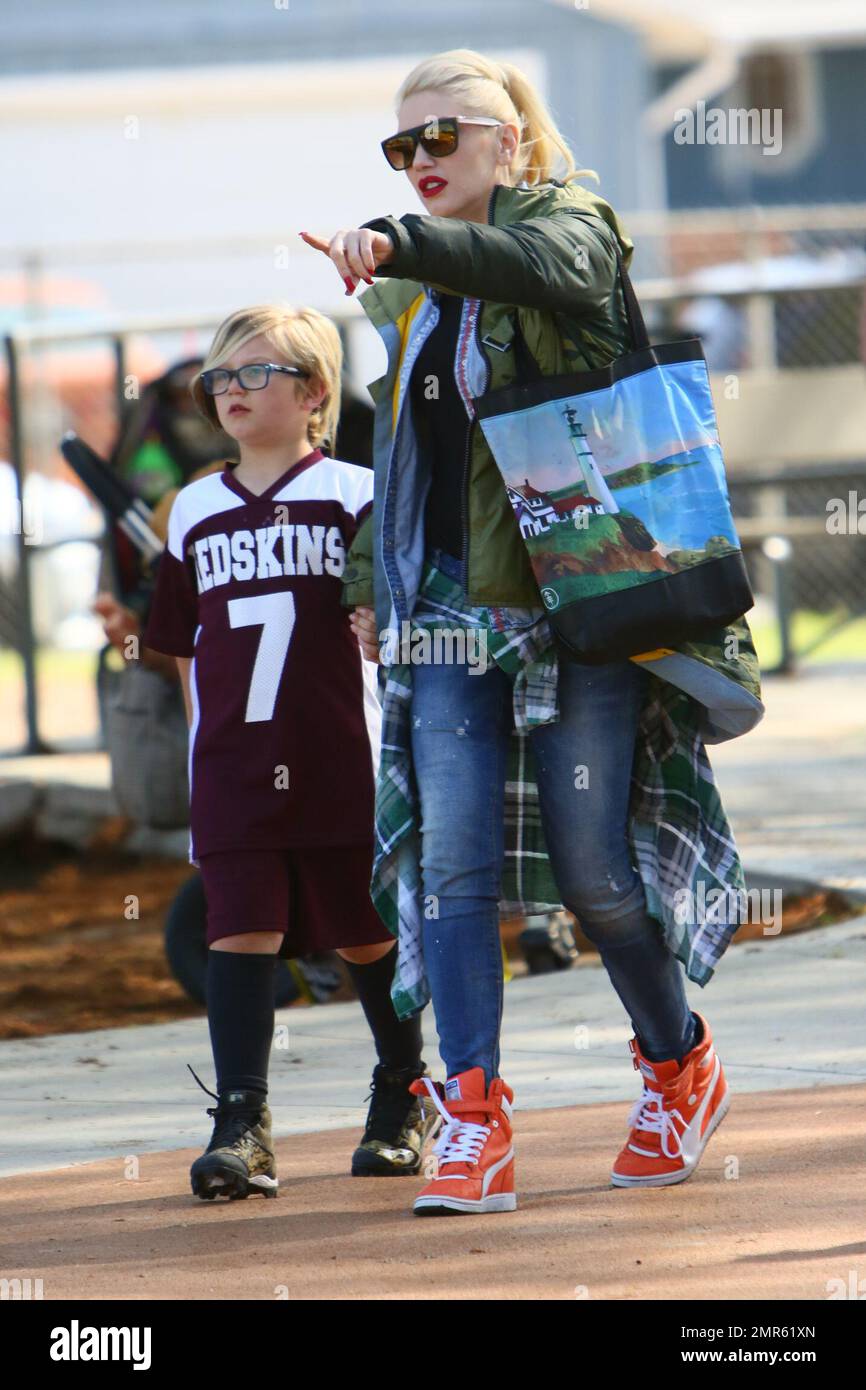 WORLDWIDE - Gwen Stefani brings the kids to a flag football game