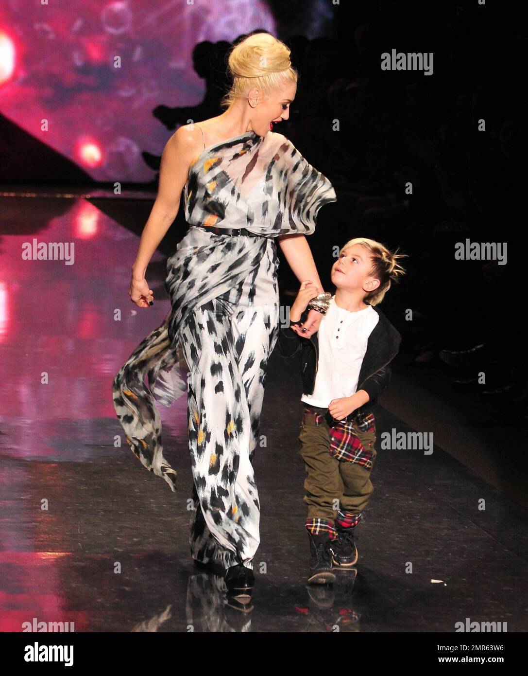 Singer and L.A.M.B. fashion designer Gwen Stefani walks the runway in a  sheer patterned maxi dress at the Fall 2011 L.A.M.B. fashion show held at  Lincoln Center during Mercedes-Benz Fashion Week. Gwen,