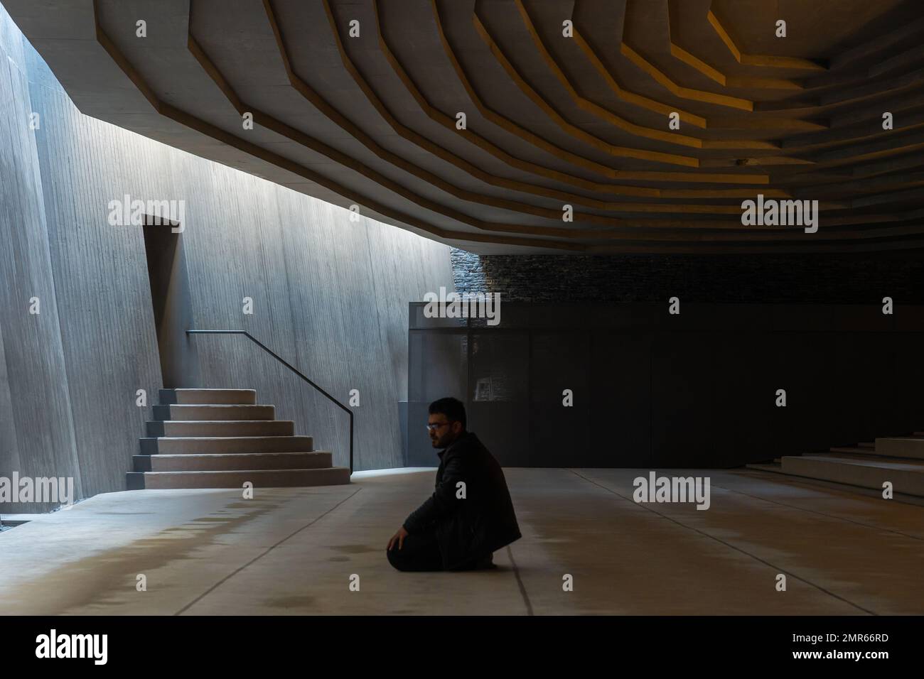 Praying muslim man. Islamic photo. Praying in a modern mosque. Istanbul Turkiye - 11.12.2022 Stock Photo