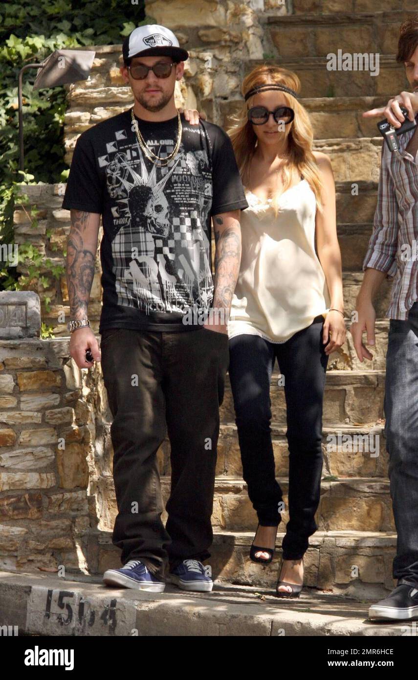 Nicole Richie and Joel Madden were seen house hunting today, having accompanied a real estate agent to several homes in the Hollywood Hills. Rumors persist about Nicole and Joel's supposed deteriorating relationship but these photos suggest otherwise. The two appeared to be very happy and excited to be in each others company. Los Angeles, CA. 8/27/08. Stock Photo