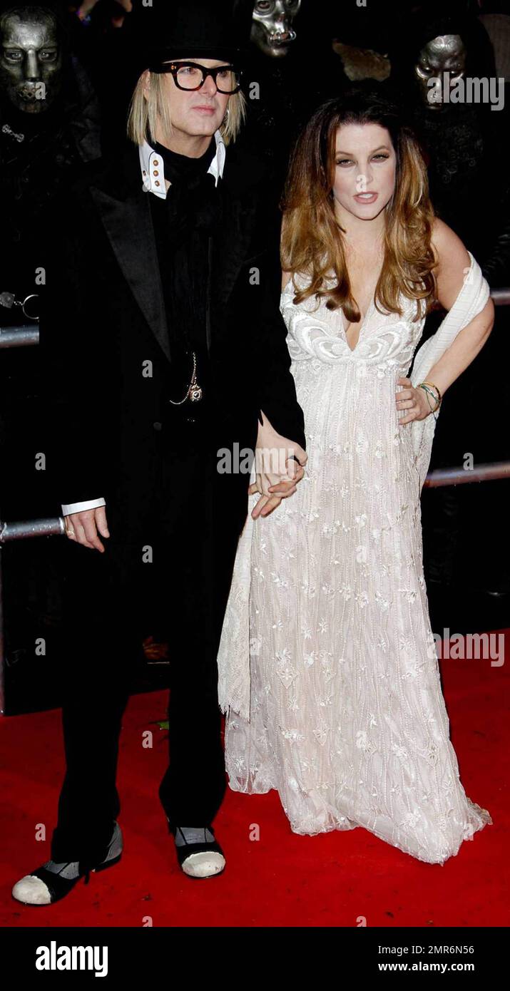 Lisa Marie Presley and Michael Lockwood pose on the red carpet at the ...