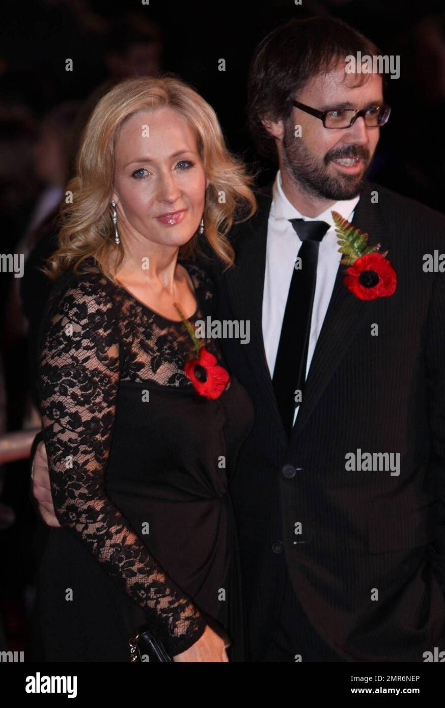J. K. Rowling and Dr. Neil Murray pose on the red carpet at the world premiere of Warner Bros. 'Harry Potter and the Deathly Hallows: Part 1' held at the Odeon West End in Leicester Square. London, UK. 11/11/10. Stock Photo