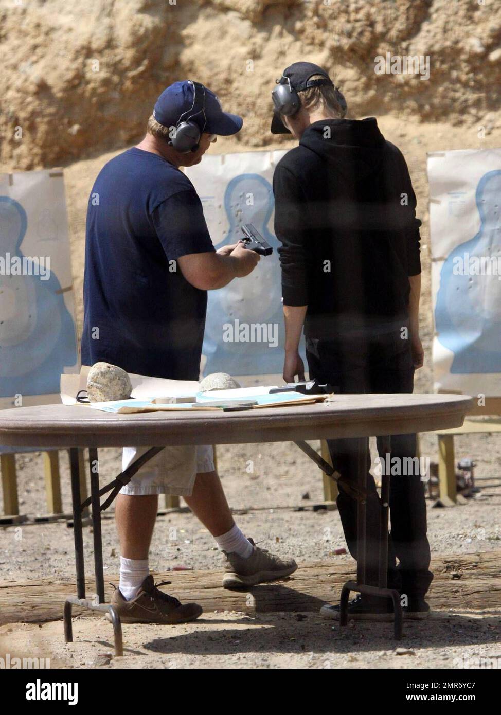 Hayden Christensen traded in his light saber for a semiautomatic hand