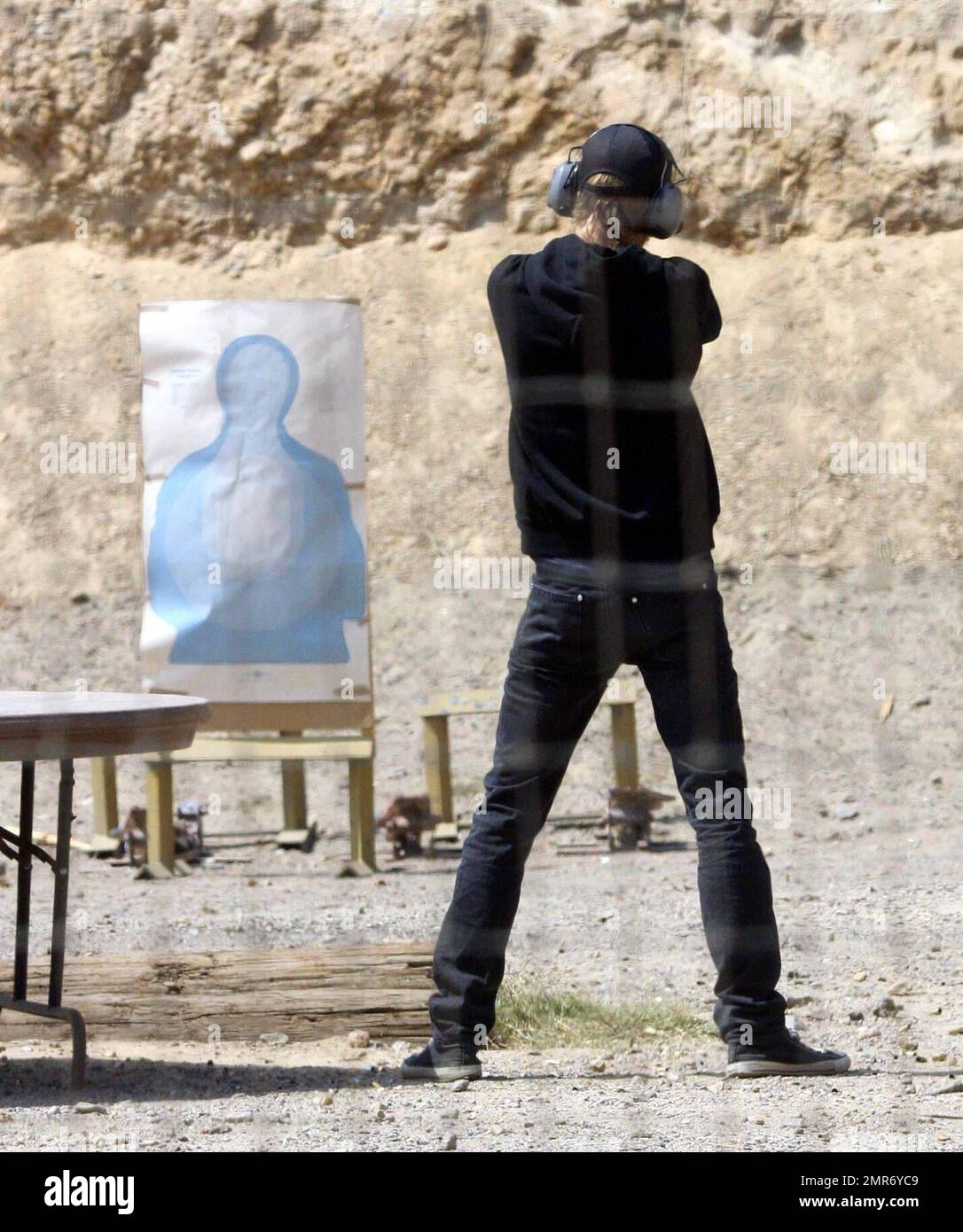 Hayden Christensen traded in his light saber for a semiautomatic hand