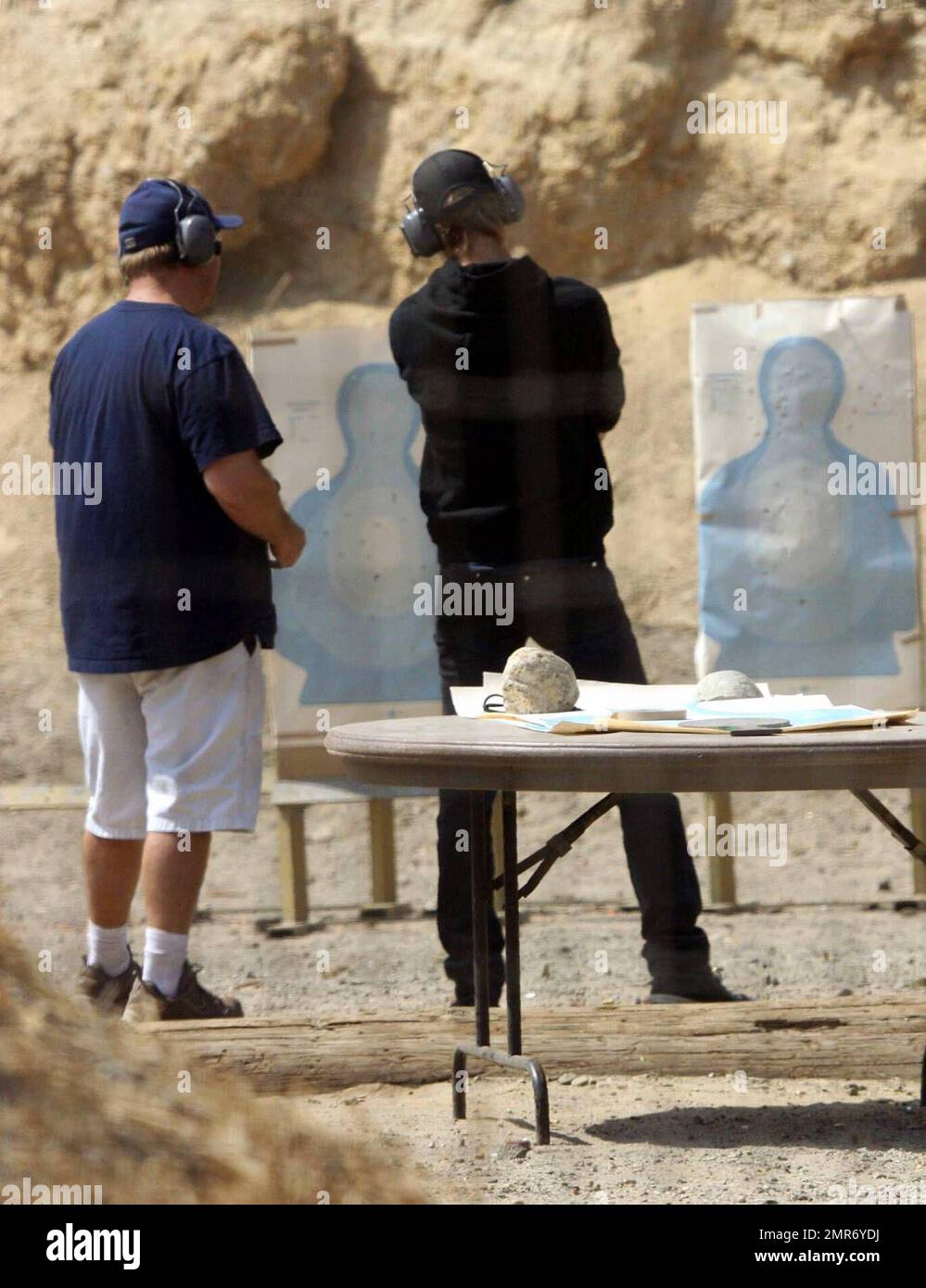 Hayden Christensen traded in his light saber for a semiautomatic hand