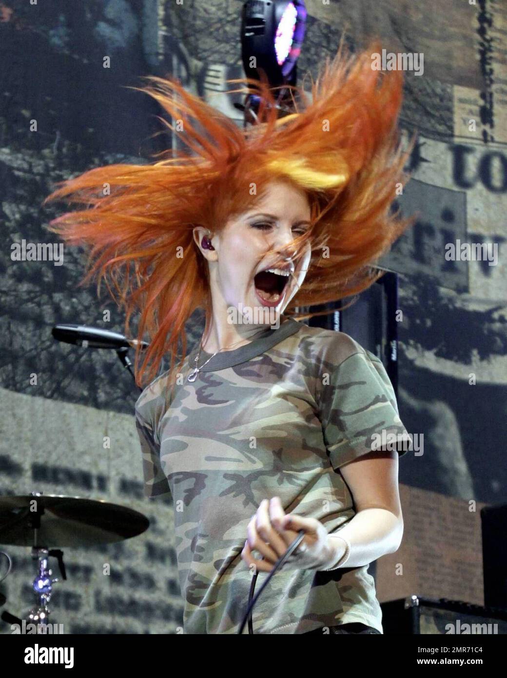 Paramore lead singer Hayley Williams rocks her trademark red hair live