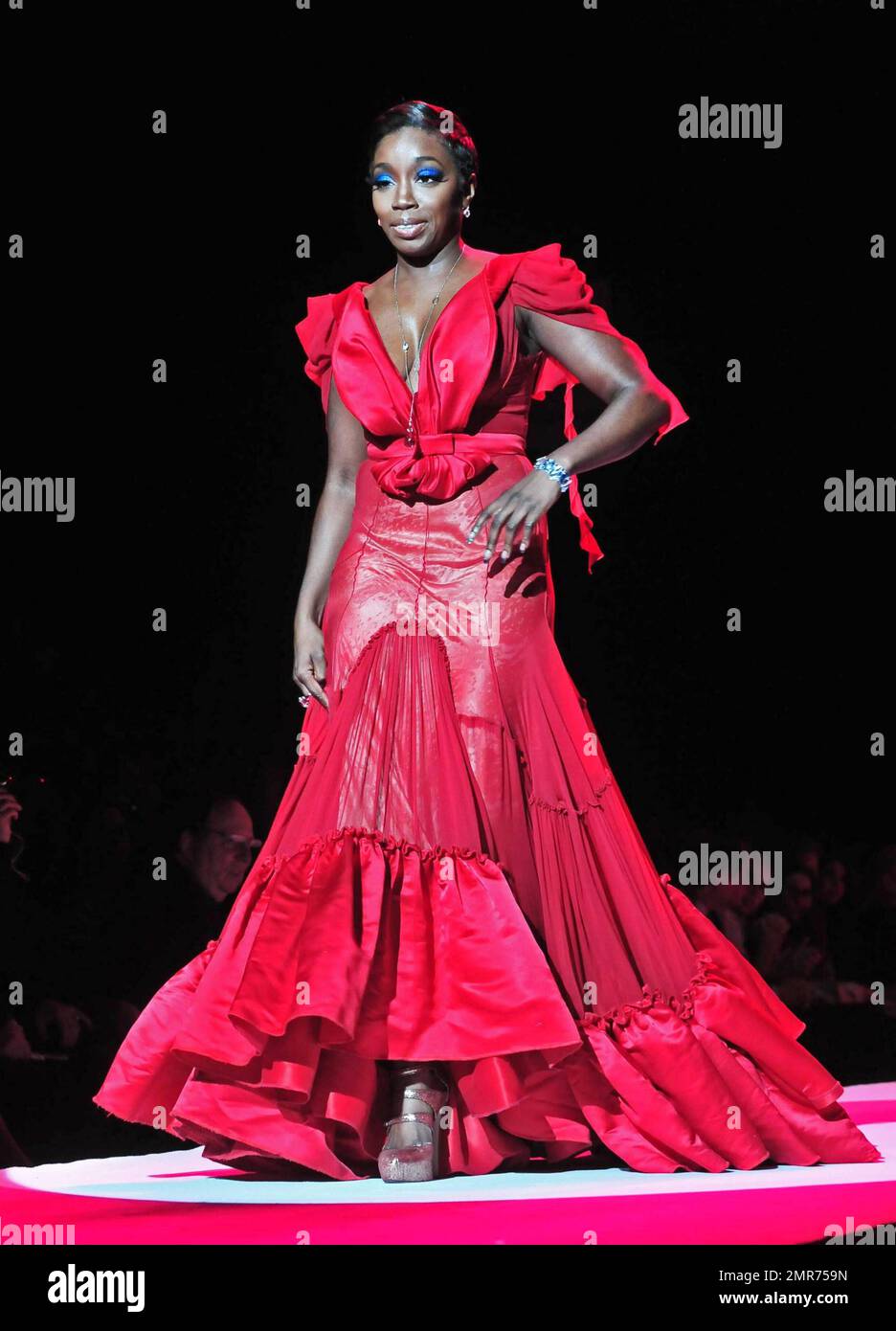 Musician Estelle models a red dress at the annual Heart Truth Fashion ...