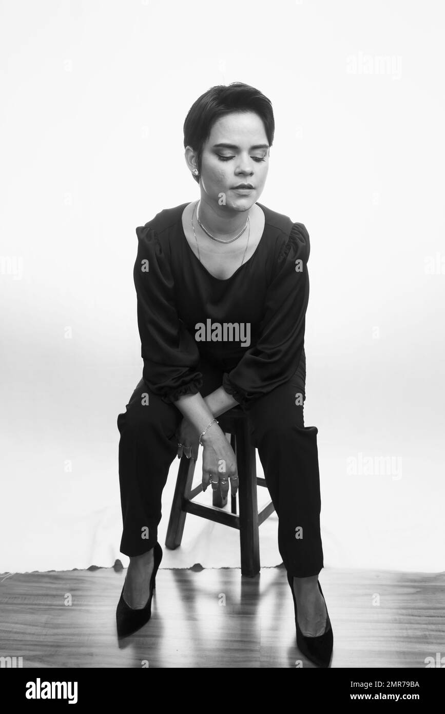 Black and white portrait of beautiful business woman. Isolated against ...
