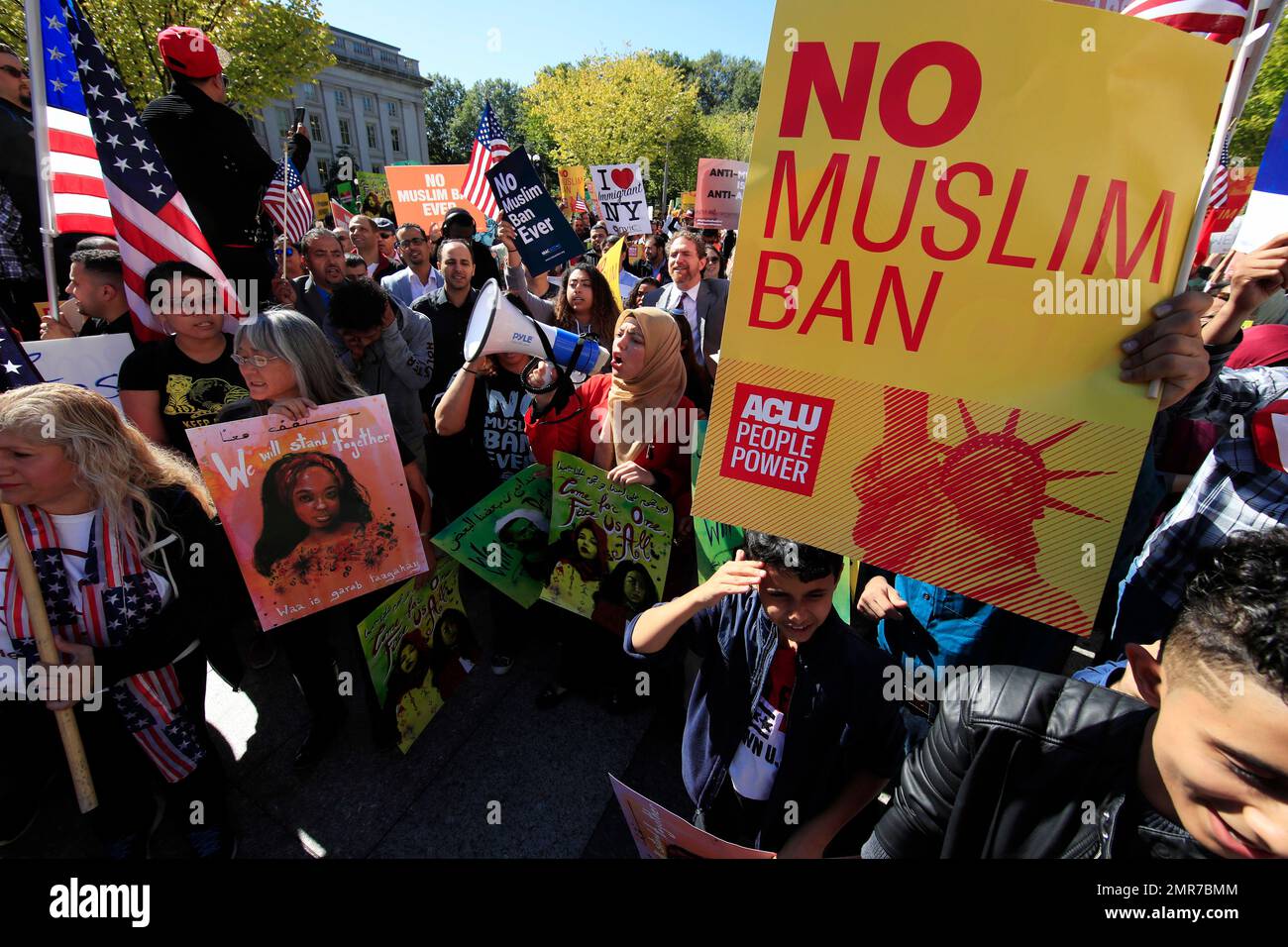 Muslim and civil rights groups and their supporters gather at a rally ...
