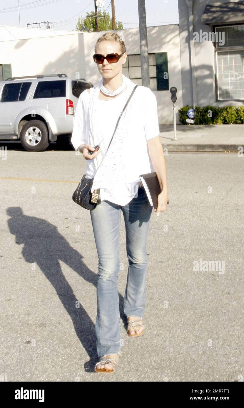 A very casual Heidi Klum, dressed in jeans and sandals leaves the Neil  George Salon with her hair up. Los Angeles, CA. 5/2/08 Stock Photo - Alamy