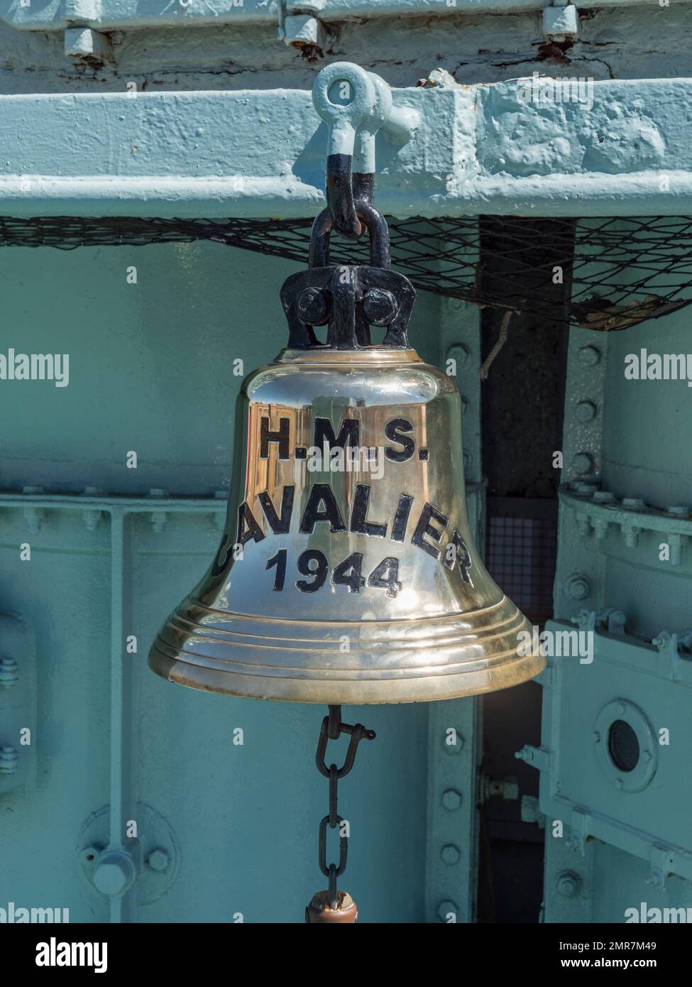 Ships bell on the HMS Cavalier (D73/R73), a C-class destroyer on display in the Historic Dockyard Chatham, Kent, UK. Stock Photo