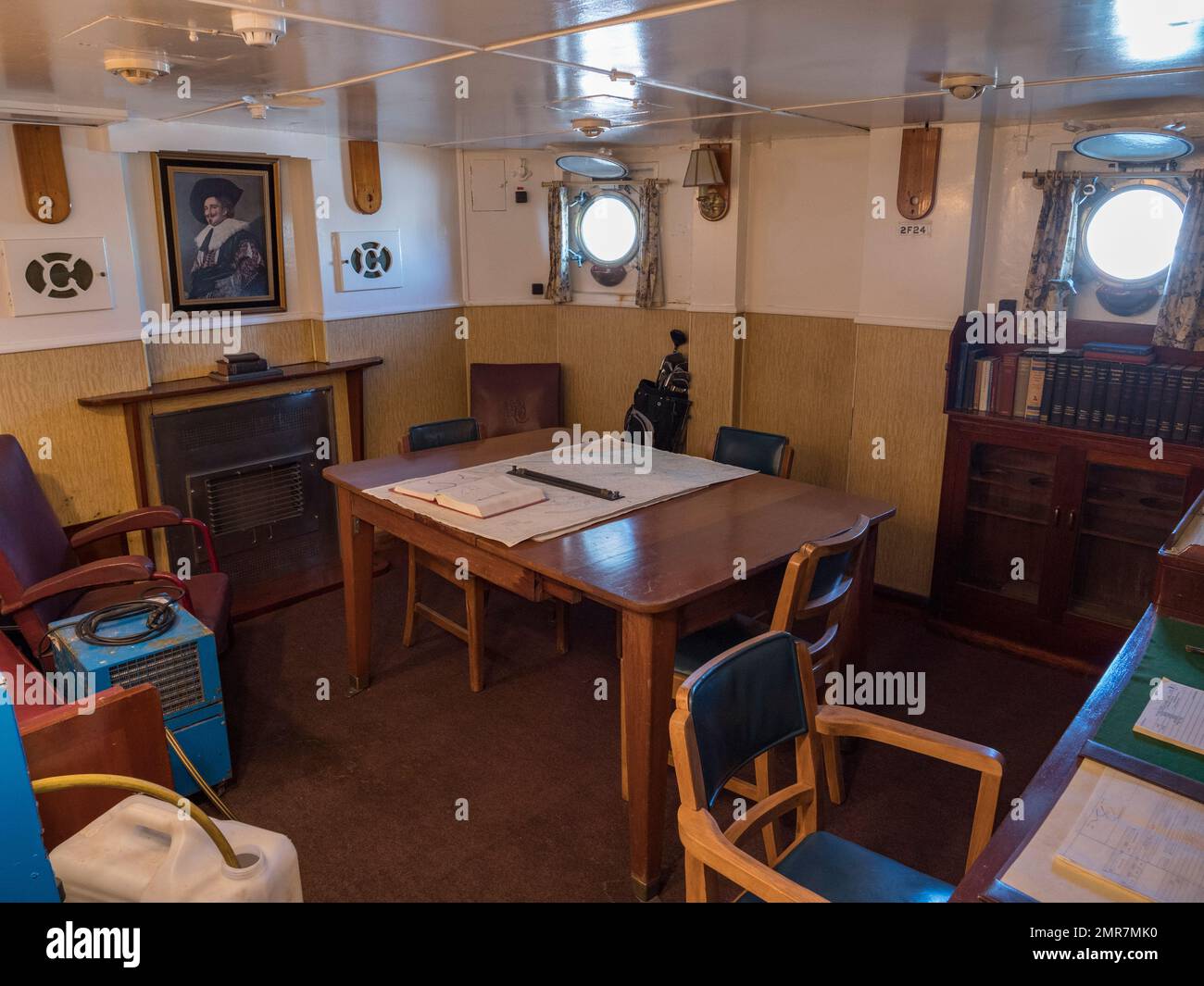 Commanding Officers Day Cabin inside HMS Cavalier (D73/R73), a C-class destroyer on display in the Historic Dockyard Chatham, Kent, UK. Stock Photo