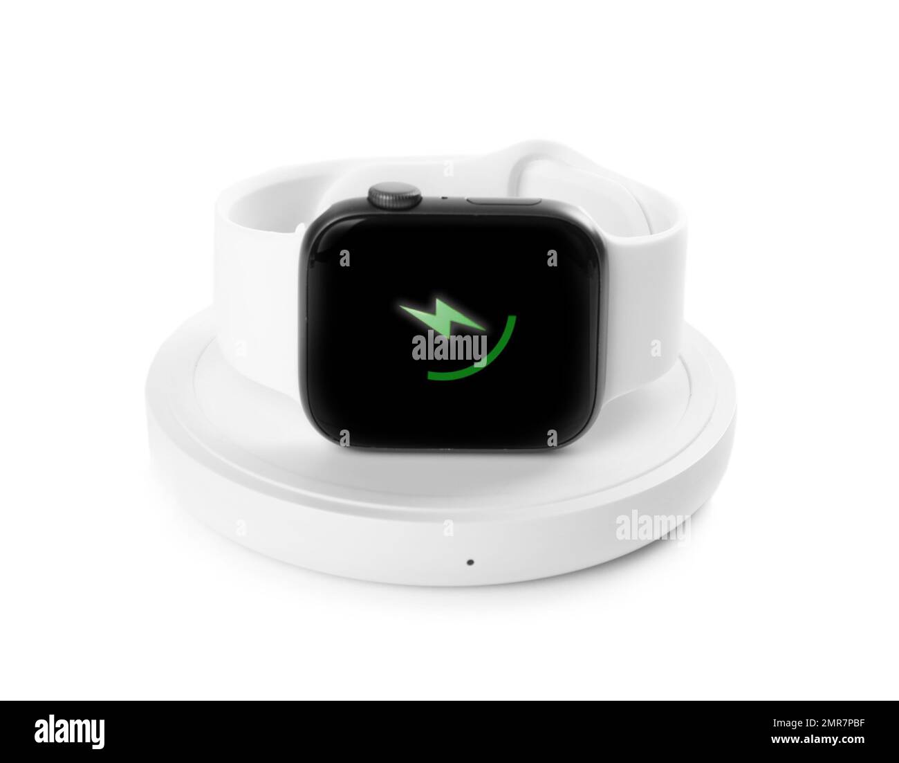 Smartwatch charging with wireless pad isolated on white Stock Photo Alamy