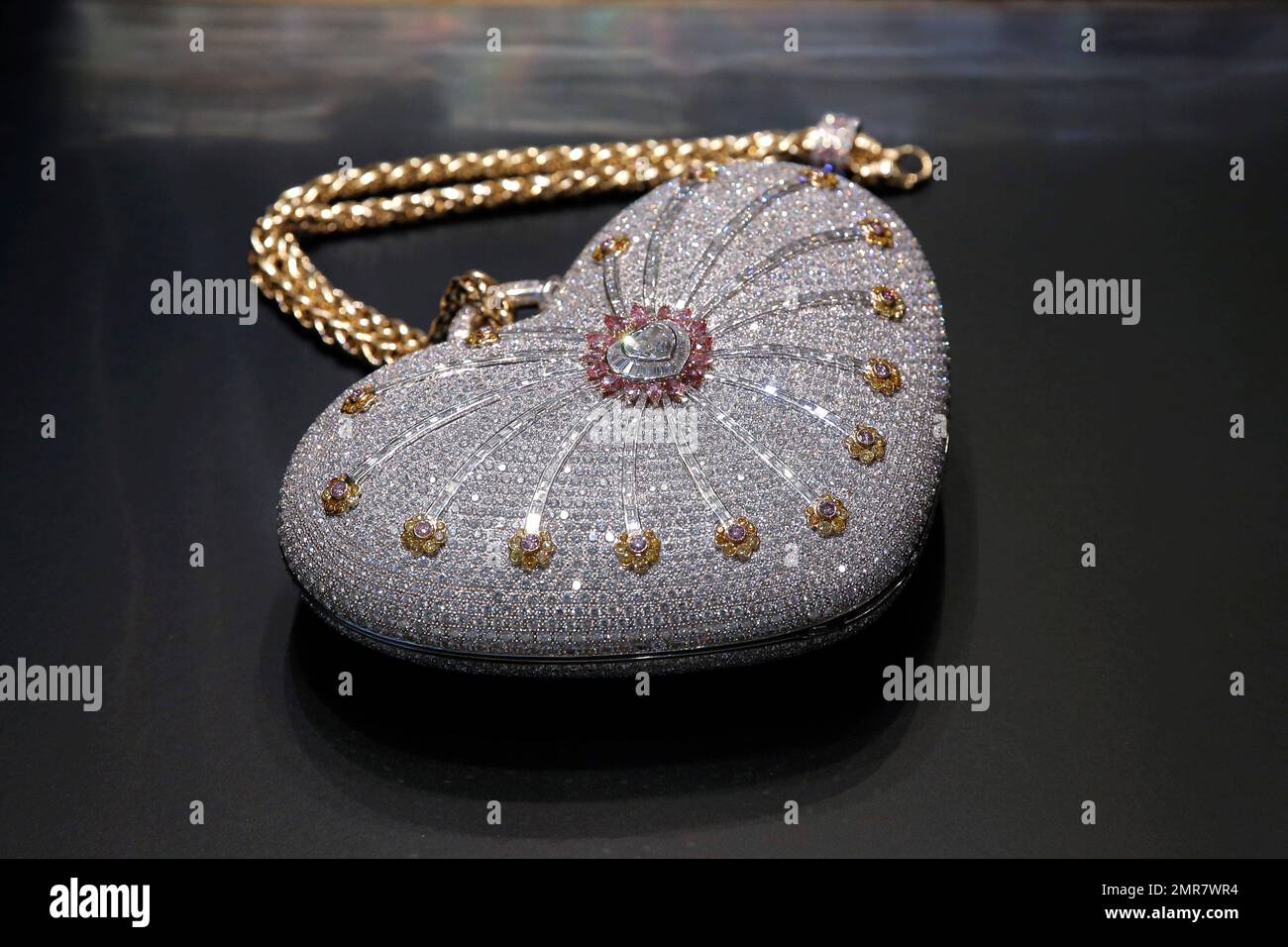 A heart shaped handbag the Mouawad 1001 Nights Diamond Purse which incorporated 4 517 diamonds with a total weight of 381.92 carats is displayed by the Christie s Hong Kong during an auction preview i...