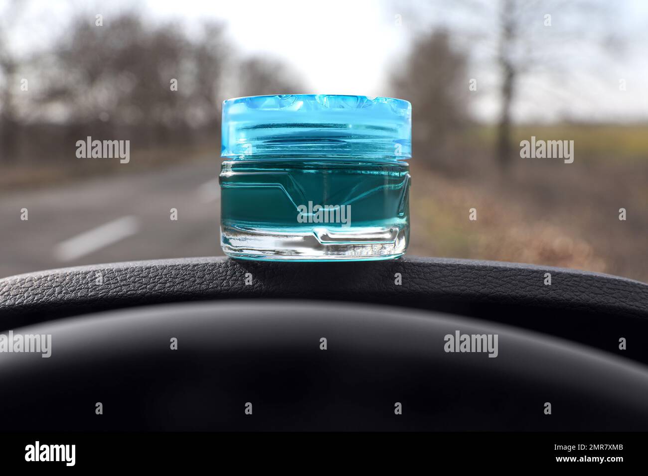 Stylish air freshener on dashboard in car Stock Photo Alamy