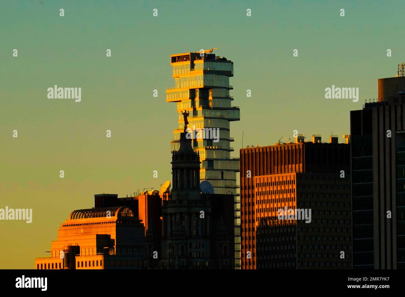 Jenga building in Manhattan at sunset light New York City Stock Photo