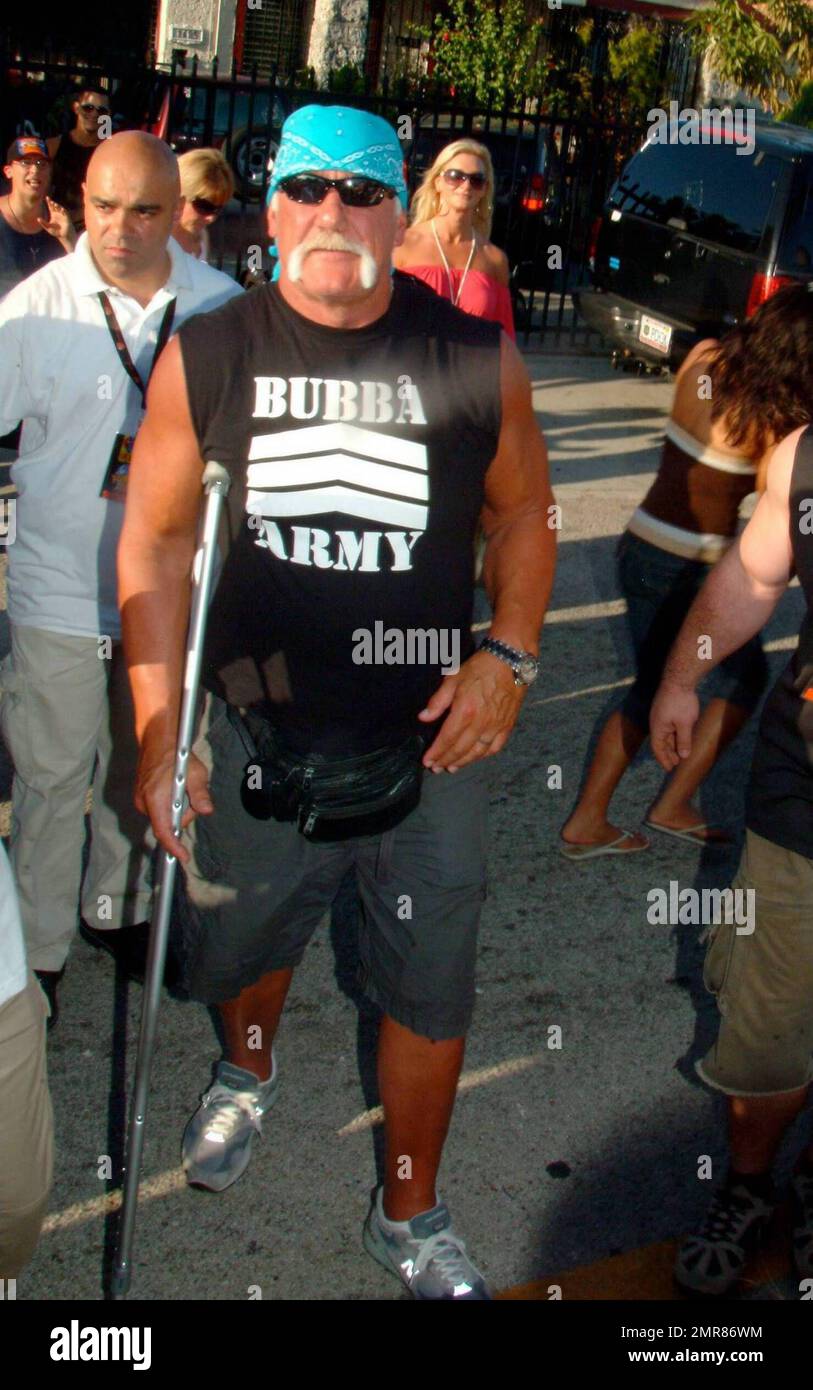 Brooke Hogan performs live during the Calle Ocho Festival in Miami's Little Havana while her dad, Hulk Hogan (aka Terry Bollea) looks on with girlfriend Jennifer McDaniel. After the performance, Brooke took some time to pose with her dad and sign autographs for fans. Miami, FL. 3/15/09. Stock Photo