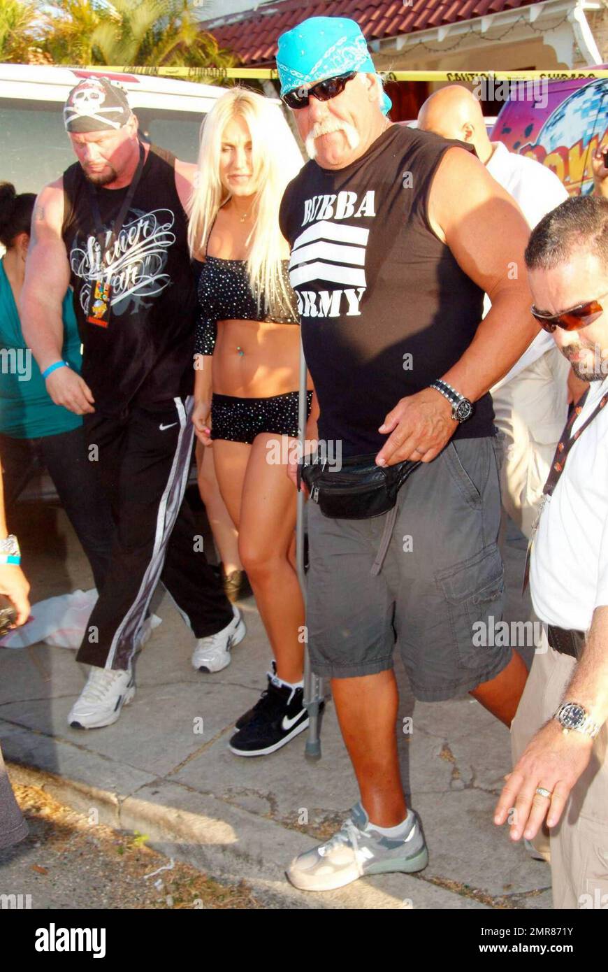 Brooke Hogan performs live during the Calle Ocho Festival in Miami's Little Havana while her dad, Hulk Hogan (aka Terry Bollea) looks on with girlfriend Jennifer McDaniel. After the performance, Brooke took some time to pose with her dad and sign autographs for fans. Miami, FL. 3/15/09. Stock Photo