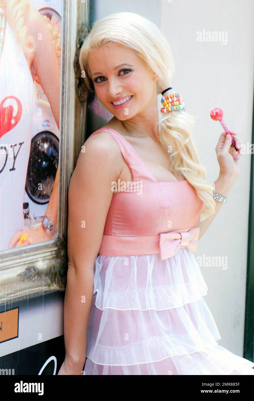 Former girlfriend to Hugh Hefner and Playboy pinup girl Holly Madison  unveils Sugar Factory's signature Vegas Edition Couture Pops at Paris Las  Vegas Hotel & Casino on National Lollipop Day. Madison donned