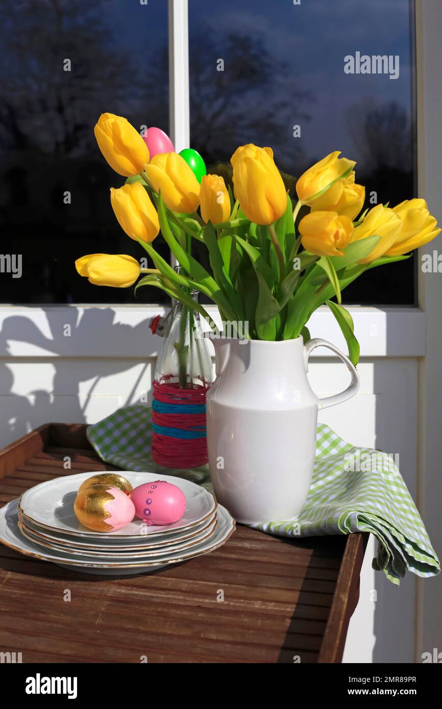 Bouquet of tulips and Easter eggs on a balcony, Dresden, Saxony Stock Photo