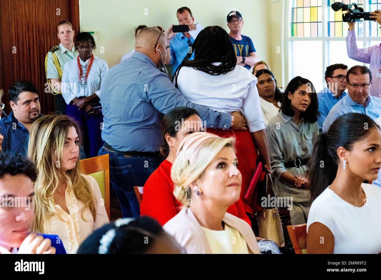 ARUBA A protester interrupts a lecture at the University of Aruba during the visit of King