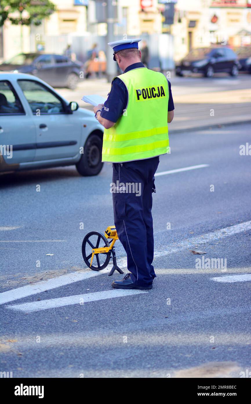 Car crash accident. A traffic policeman during an action Stock Photo ...