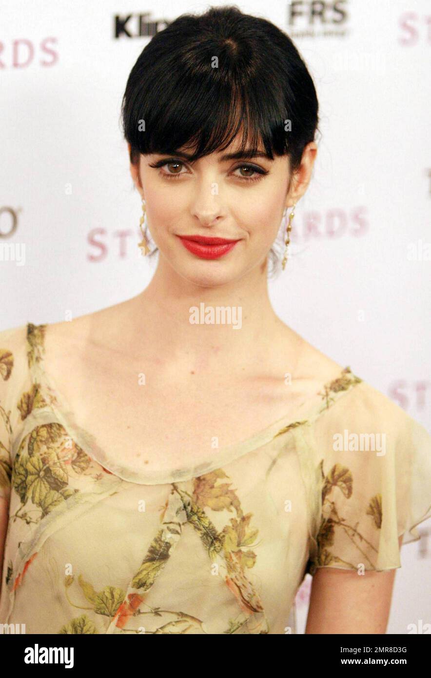 Krysten Ritter poses or photographers at the 2010 Hollywood Style