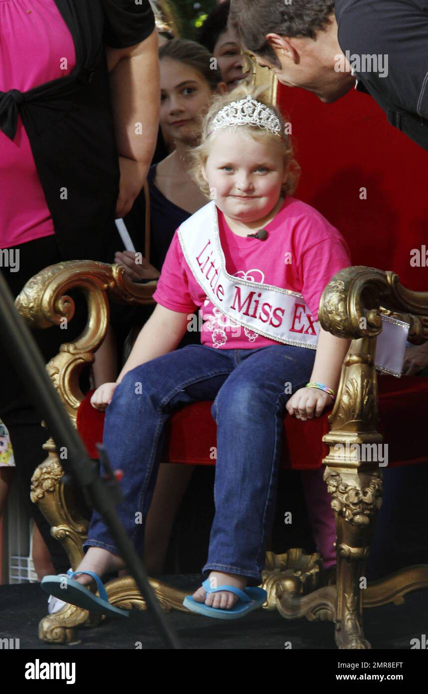 Honey Boo Boo (aka Alana Thompson), star of the TLC reality show "Here Comes Honey Boo Boo," and her mother June Shannon make an appearance at The Grove shopping center for an interview with Jerry Penacoli. During the interview, the child beauty pageant star wore a sash that read "Little Miss Extra." Los Angeles, CA. 15th October 2012. Stock Photo