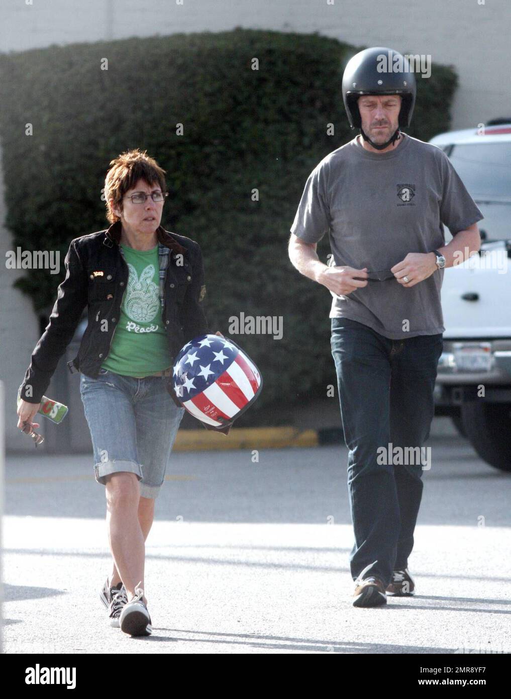 Exclusive!! Hugh Laurie and his wife Jo spend some rare time together