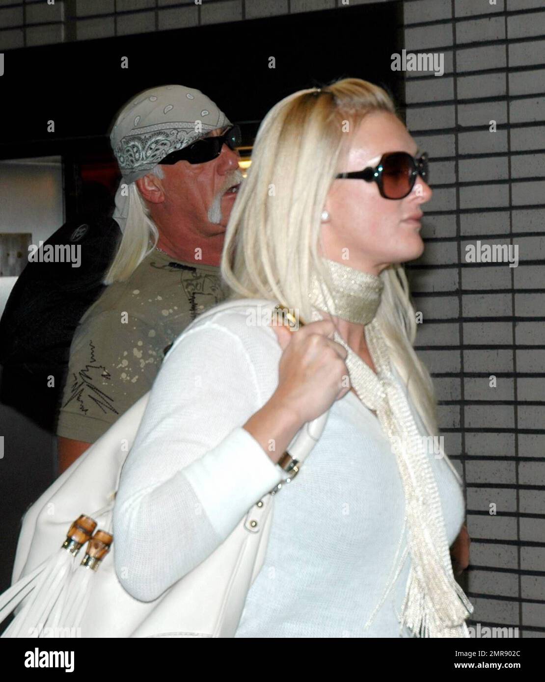 Exclusive!! Hulk Hogan and girlfriend Jennifer McDaniel arrive at Tampa