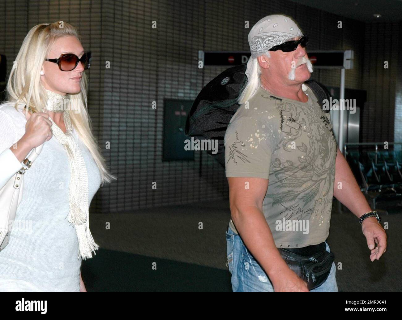 Exclusive!! Hulk Hogan and girlfriend Jennifer McDaniel arrive at Tampa