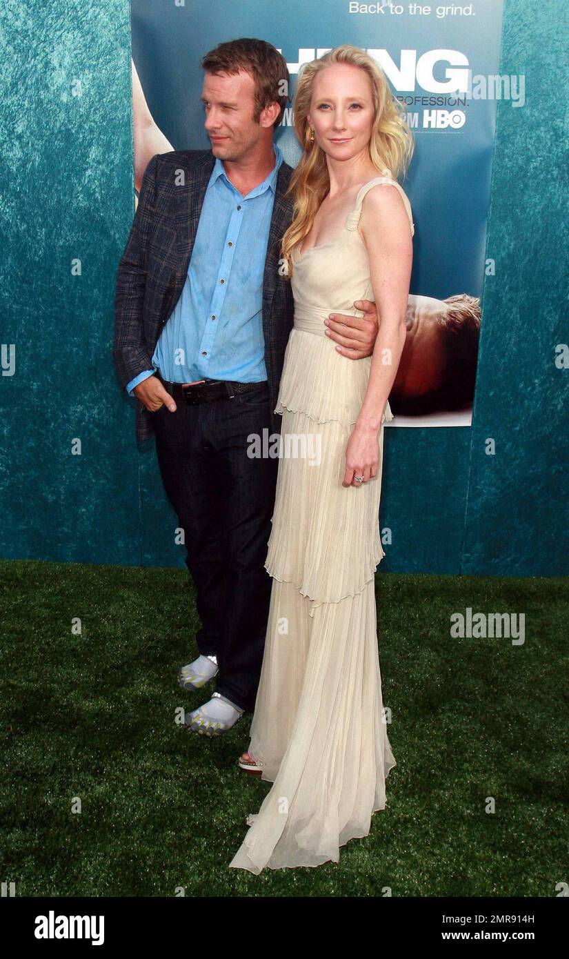 Actor Thomas Jane, wearing a pair of Vibram FiveFingers shoes, and Anne ...