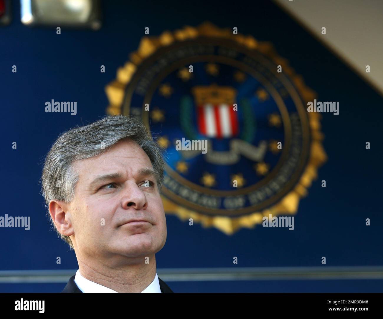 F.B.I director Christopher Wray is shown before speaking to reporters during a dedication