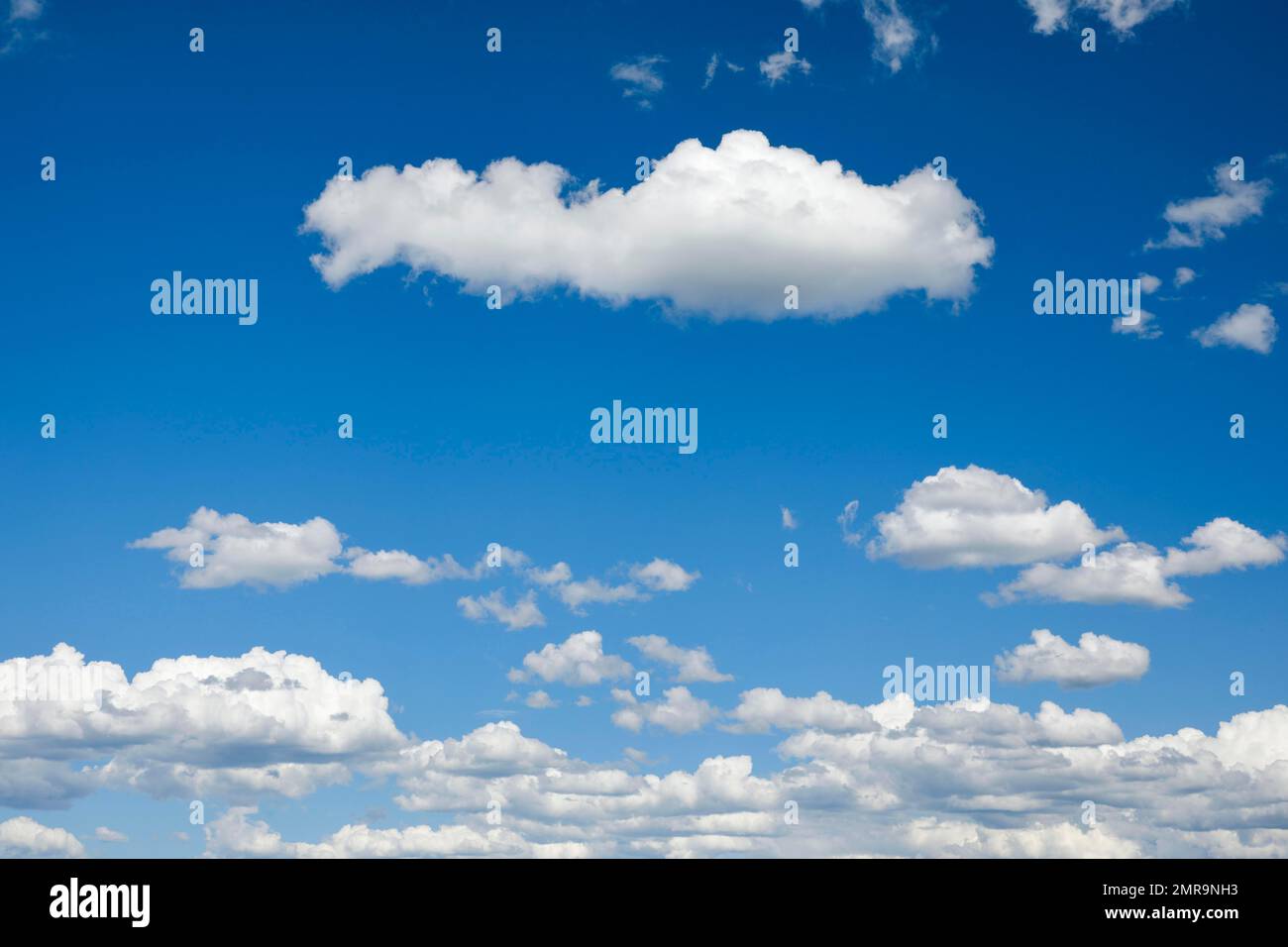 Beautiful white spring clouds in the blue sky, Switzerland, Europe Stock Photo