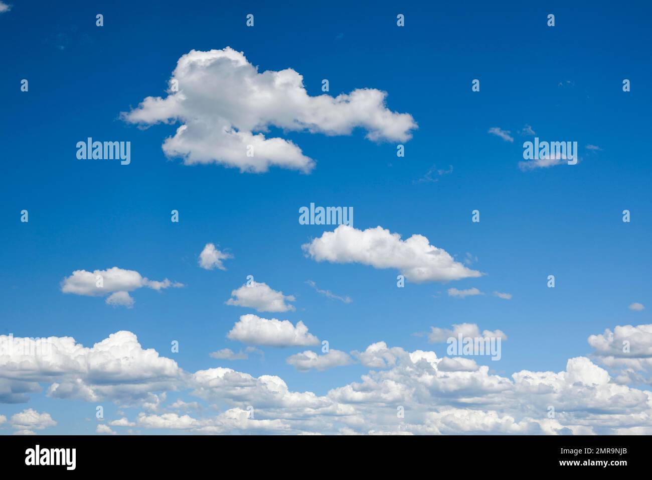 Beautiful white spring clouds in the blue sky, Switzerland, Europe Stock Photo