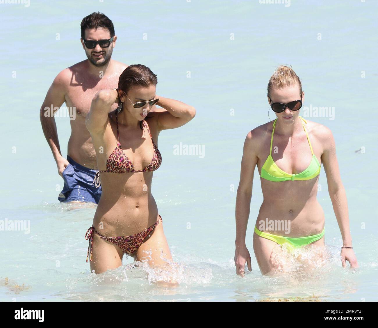 Irina Shayk looks bikini hot as she spends another day on Miami Beach, FL,  24th March 2012 Stock Photo - Alamy