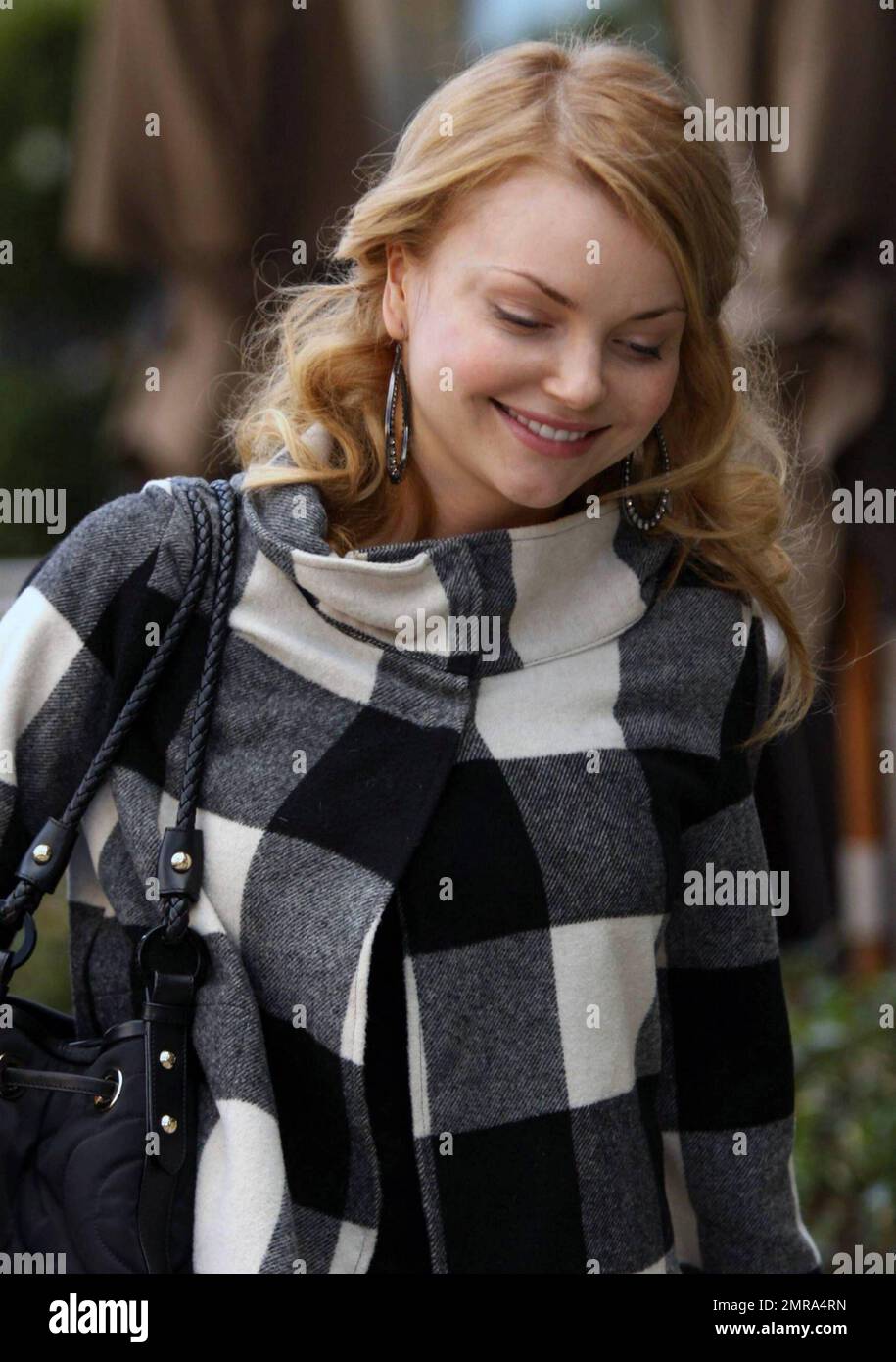 EXCLUSIVE!! Polish actress Izabella Miko is all smiles while out shopping on Robertson Blvd. Best-known for appearances in 'Coyote Ugly' and the recent remake of 'Clash of the Titans,' Miko is set to appear in the television series, 'The Cape,' which is due to premiere on NBC January 9, 2011. Los Angeles, CA. 1/6/11. Stock Photo