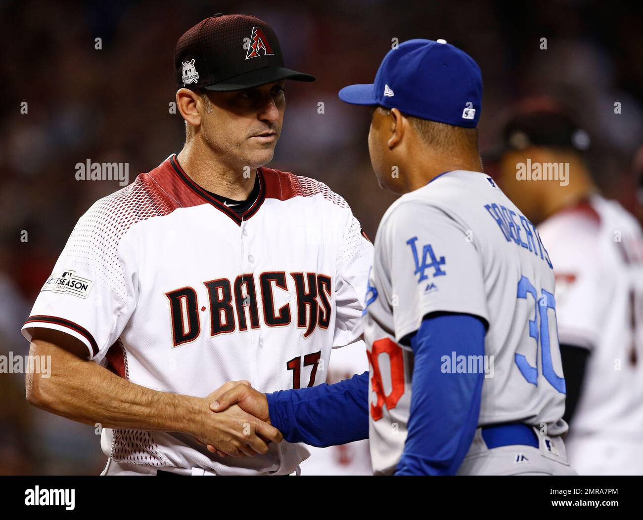 Arizona Diamondbacks manager Torey Lovullo (17) greets Los Angeles