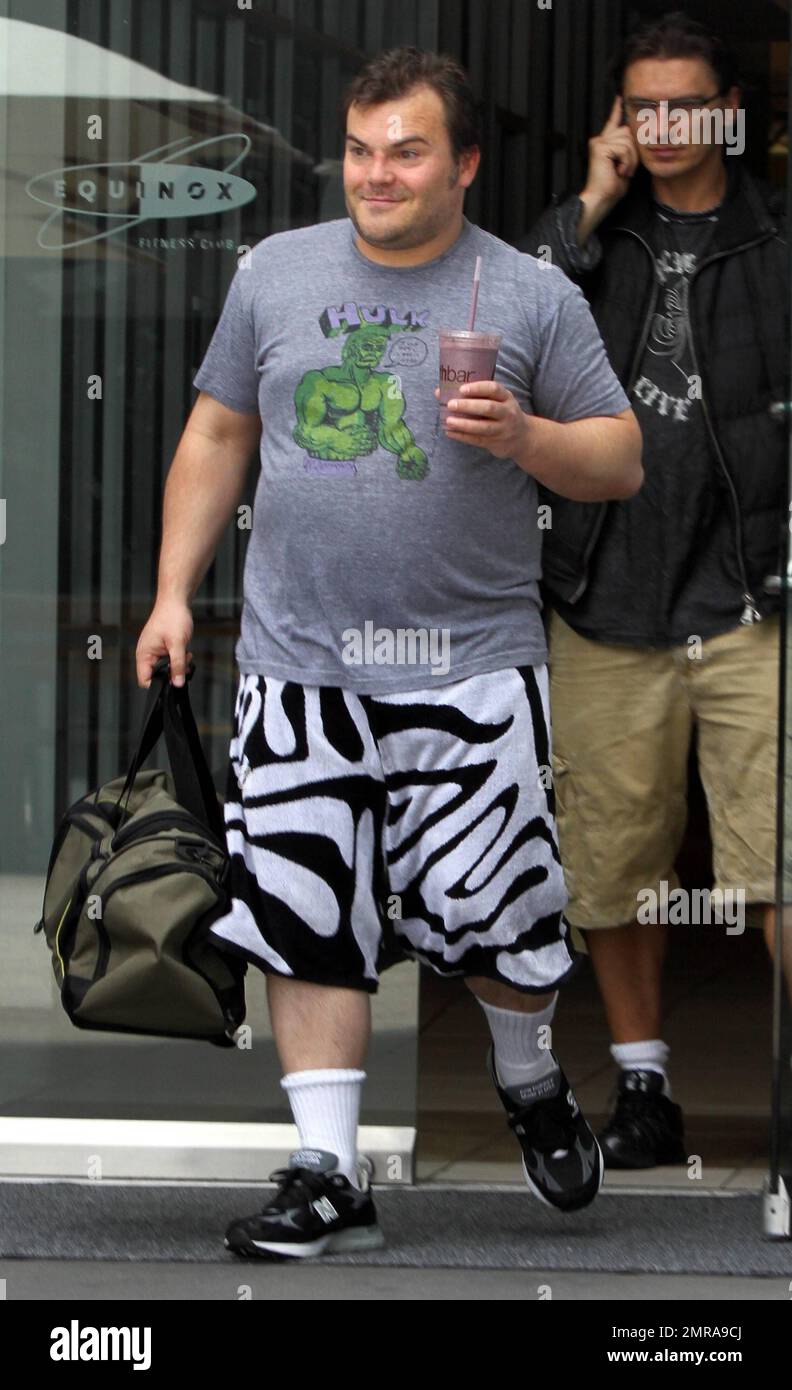 Jack Black lets his bushy beard go to its natural color as he walks round  LA in funky garish shorts