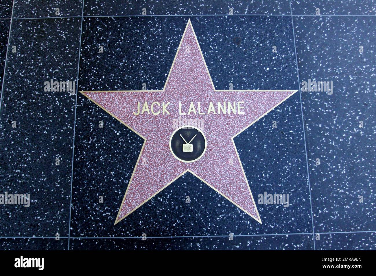 Fitness enthusiast Jack LaLanne's star on the Hollywood Walk of Fame, which he received in 2002.  LaLanne, who has been credited with starting the American fitness movement, passed away yesterday at the age of 96.  LaLanne was reportedly turned on to healthy living at the age of 15 after attending a lecture by nutritionist Paul Bragg.  Memorable stunts that Jack undertook in the 1950s included swimming the Golden Gate Channel towing a 2500-pound cabin cruiser and completing 1033 pushups in 23 minutes on TV. Los Angeles, CA. 01/24/11. Stock Photo