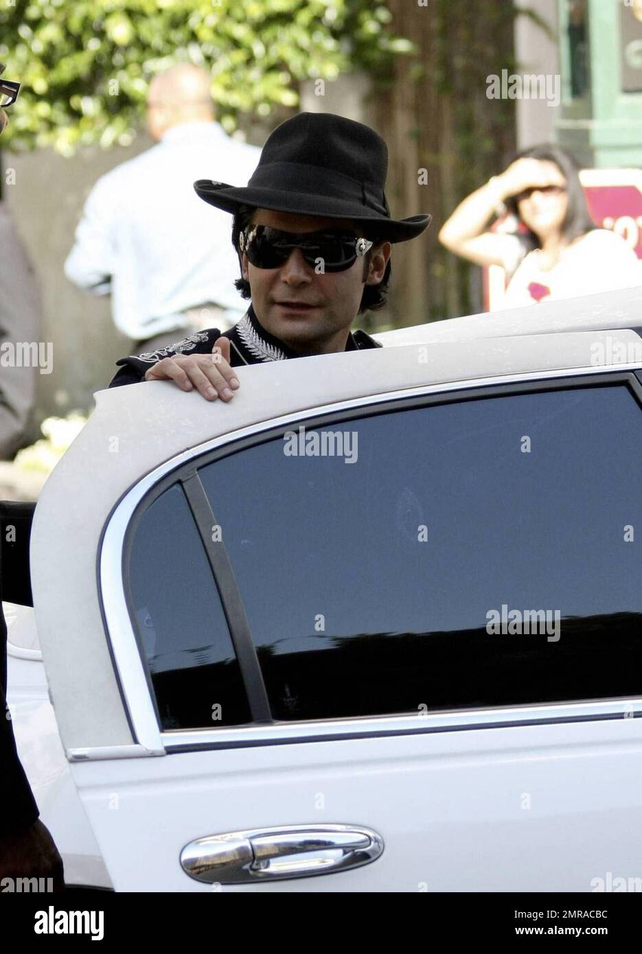 Corey Feldman dressed in the style of Michael Jackson with black shoes,  white socks and a studded cardigan, enjoys a day out with his girlfriend  and friend in Beverly Hills Featuring: Corey