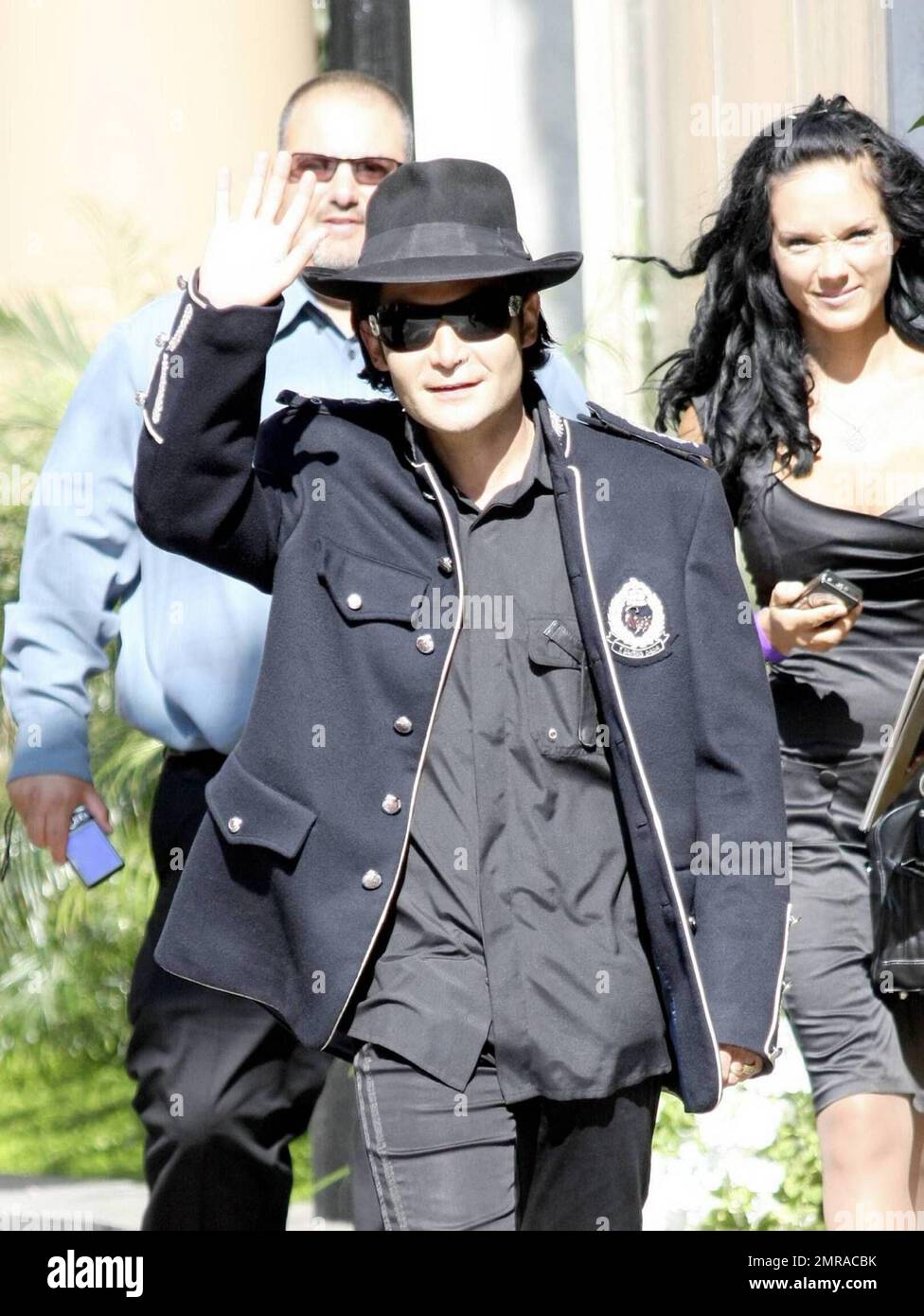 Corey Feldman dressed in the style of Michael Jackson with black shoes,  white socks and a studded cardigan, enjoys a day out with his girlfriend  and friend in Beverly Hills Featuring: Corey