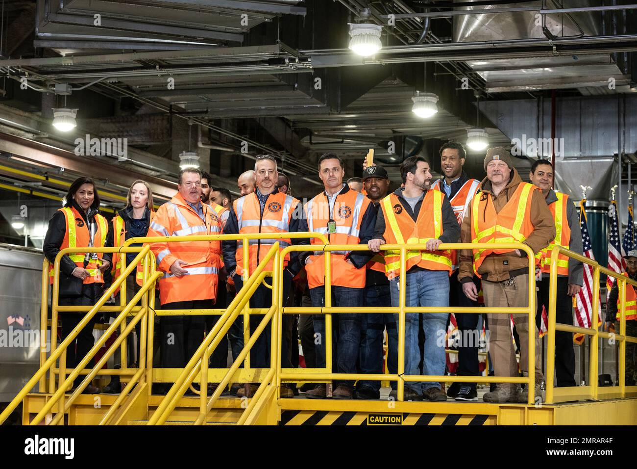 New York, USA. 31st Jan, 2023. MTA employees attend President Joe Biden Jr. remarks to highlight Bipartisan Infrastructure Law funding for the Hudson River Tunnel project at West Side Yard gate in New York on January 31, 2023. (Photo by Lev Radin/Sipa USA) Credit: Sipa USA/Alamy Live News Stock Photo