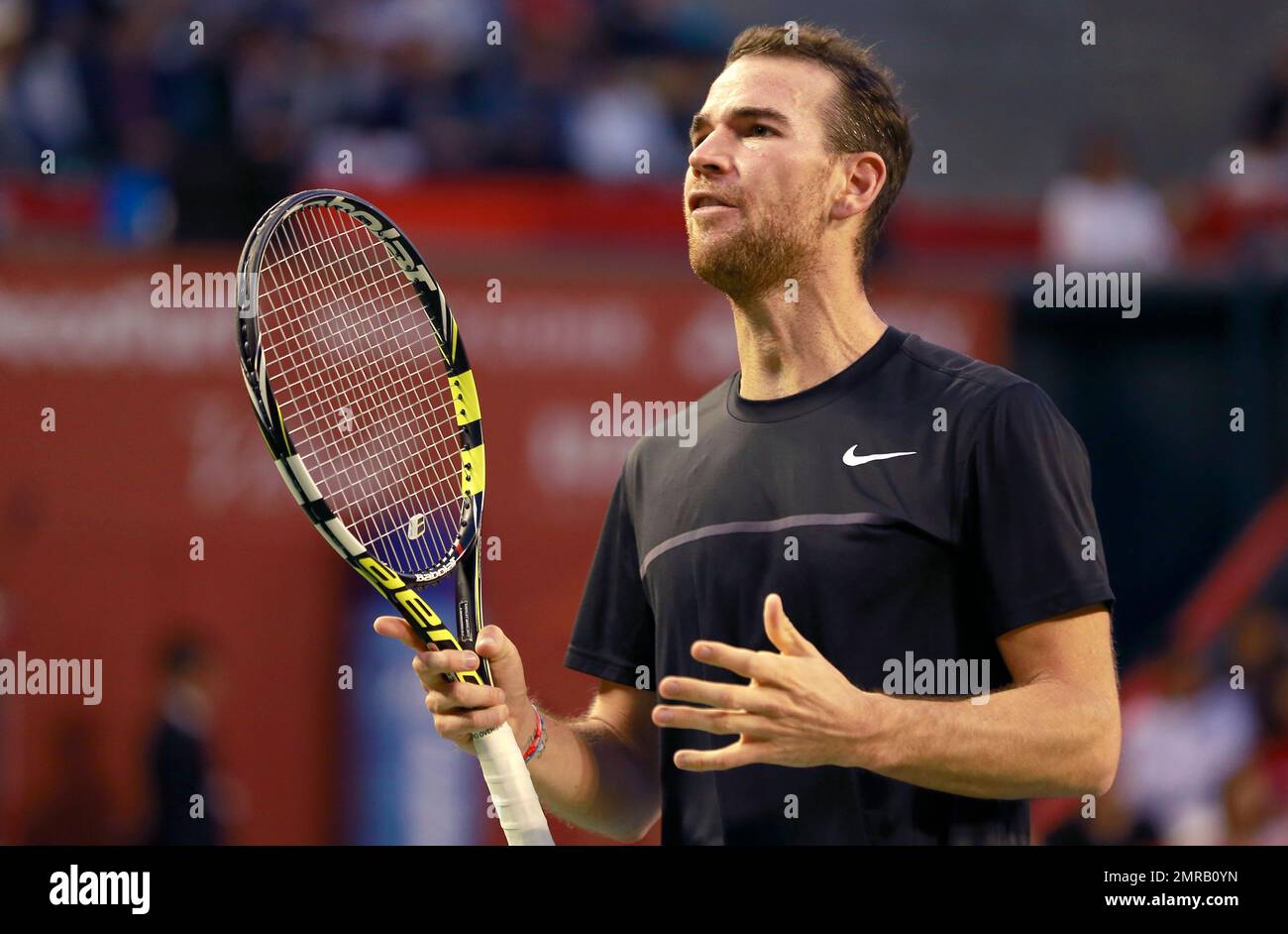 Adrian Mannarino of France reacts after losing a point David Goffin of  Belgium during their men's singles final match of the Japan Open tennis  tournament in Tokyo, Sunday, Oct. 8, 2017. (AP