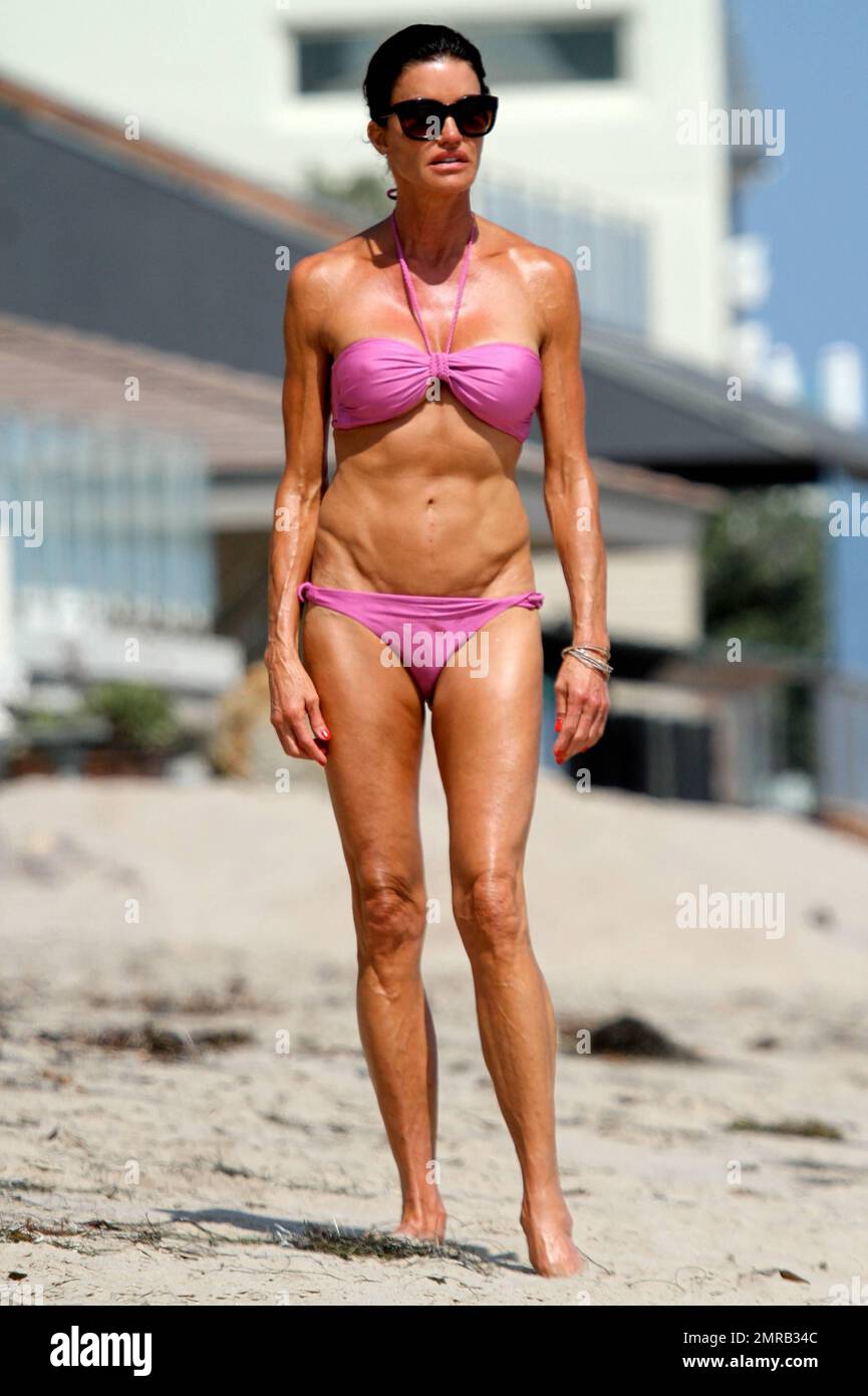janice-dickinson-shows-off-her-amazing-figure-in-a-blink-bikini-as-she