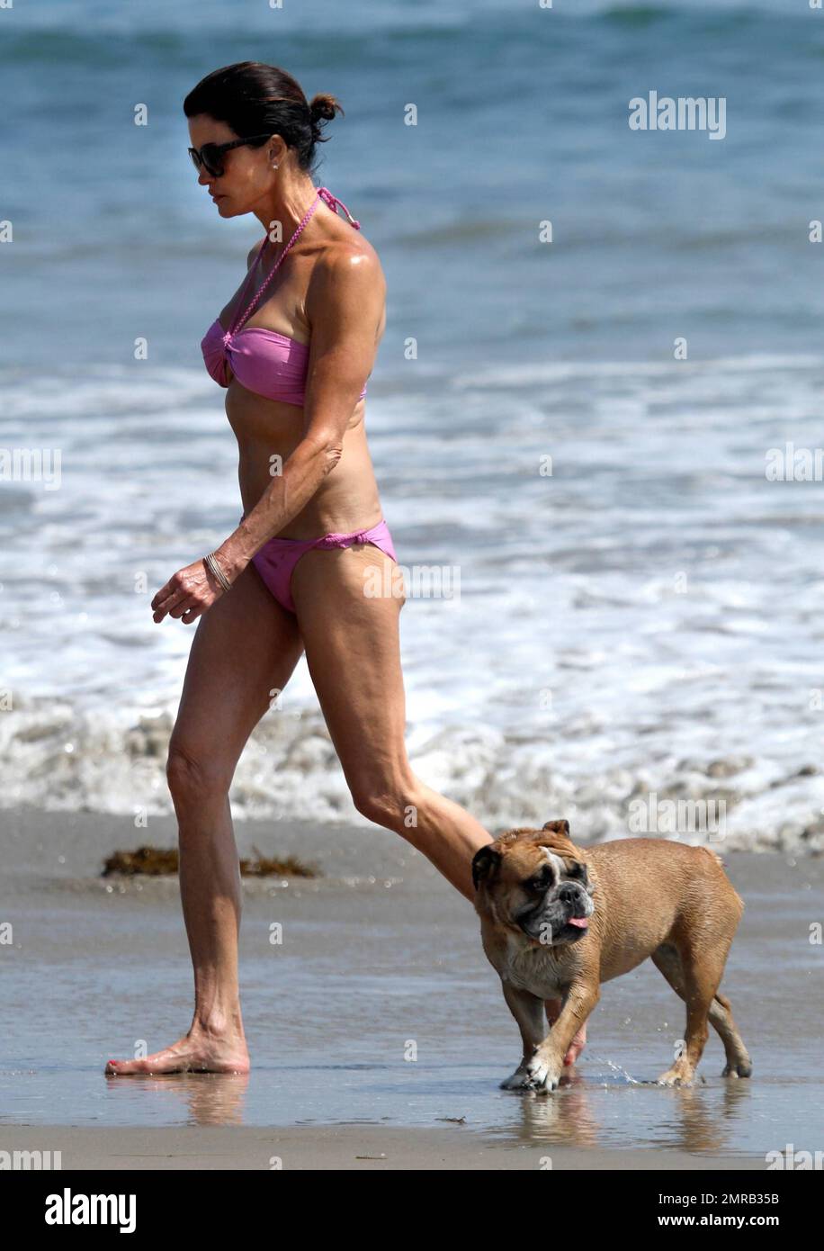 Janice Dickinson enjoys Bond Girl moment as she flashes nipples in bikini, Celebrity News, Showbiz & TV