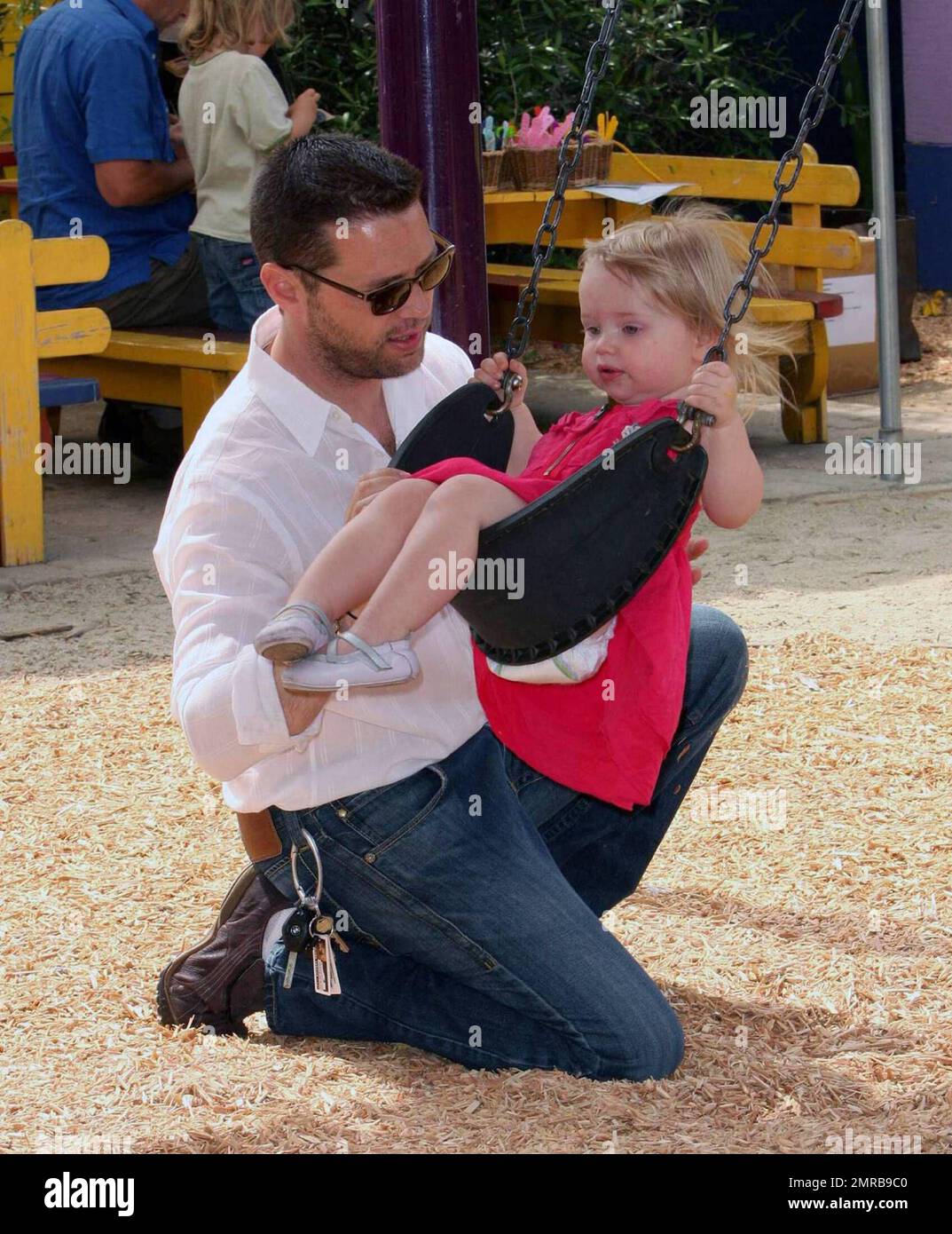 Actor/Director Jason Priestley was seen attending the 'Pregnancy Awareness Month' event in Santa Monica with his wife Naomi and 22 month old daughter Ava.  The event was held at the Little Dolphins By The Sea Preschool.  Jason and Ava spent most of their time playing at the playground.  Los Angeles, CA.  5/2/09. Stock Photo