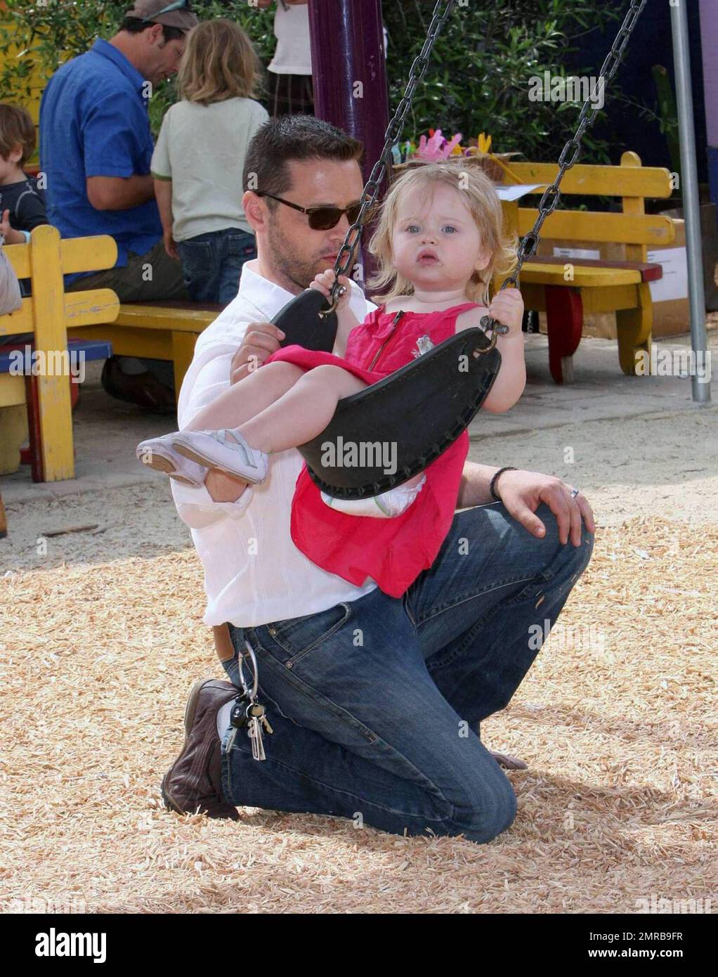 Actor/Director Jason Priestley was seen attending the 'Pregnancy Awareness Month' event in Santa Monica with his wife Naomi and 22 month old daughter Ava.  The event was held at the Little Dolphins By The Sea Preschool.  Jason and Ava spent most of their time playing at the playground.  Los Angeles, CA.  5/2/09. Stock Photo