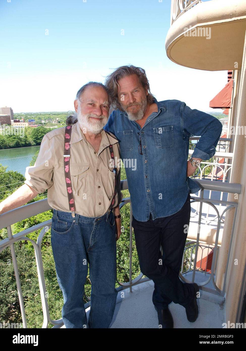 Oscar-winning actor Jeff Bridges poses for photos with Zen Master Bernie Glassman while in town filming the Coen Brothers' remake of the classic John Wayne western 'True Grit.' Bridges also stars in 'Tron Legacy' set for release in December. Austin, TX. 5/3/10.   . Stock Photo