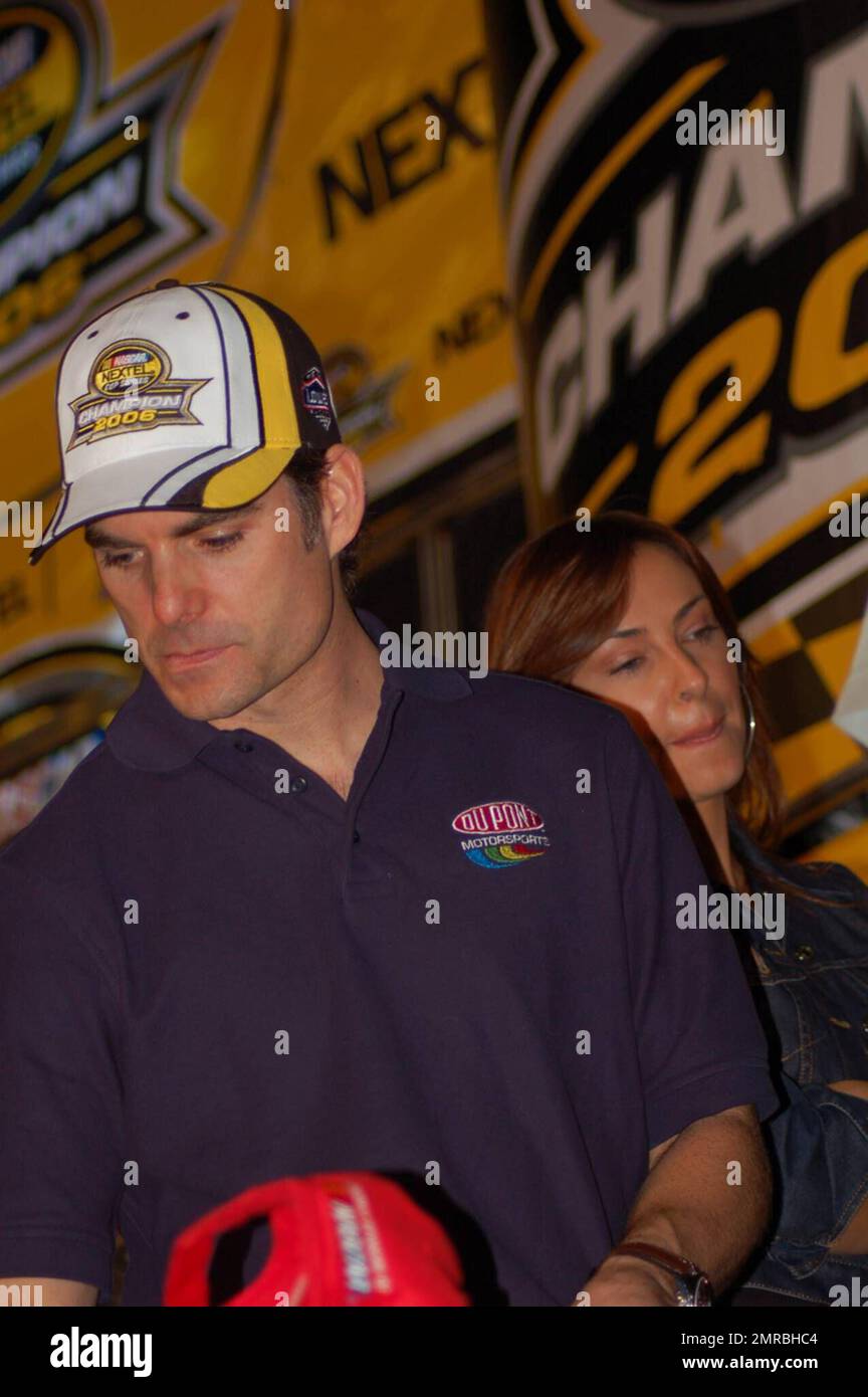 Race car driver Jeff Gordon and wife at the Ford 400 NASCAR NEXTEL Cup